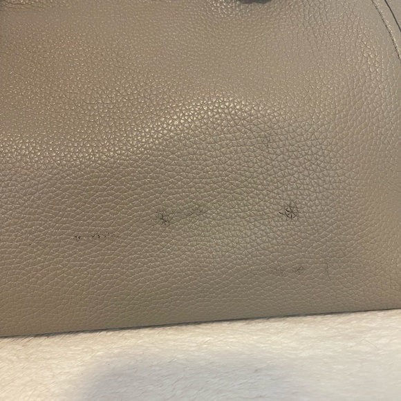 Small spotted stains on the back, bottom right corner. seen in picture - Picture 3 of 3